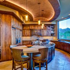 Neutral Southwest-Style Kitchen With Curved Island