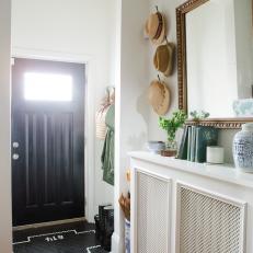 Eclectic Entryway With Vintage Gold Mirror