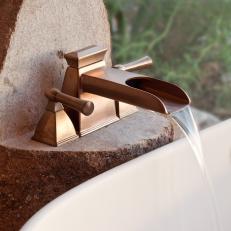 Natural Rock and Bronze Faucet in Modern Bathroom
