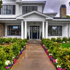 Traditional White Home Exterior with Walkway