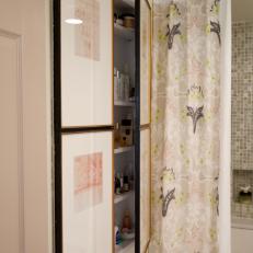 Framed Artwork Hides Bathroom Medicine Cabinet