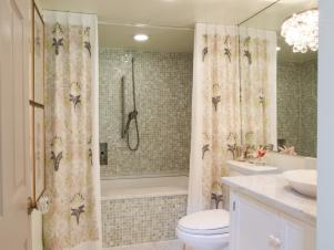 Feminine Bathroom with Marble and Mosaic Tile Show