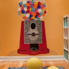 Hand-Painted Gumball Machine on Orange Playroom Wall