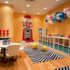 Colorful Playroom with Wall Chalkboard and Chevron Rug