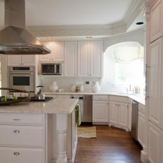 White Traditional Kitchen with Large Marble Island