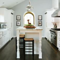 Transitional White Kitchen With Marble-Topped Island