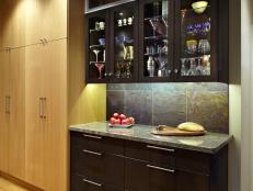 Brown Contemporary Kitchen With Glass-Door Cabinets