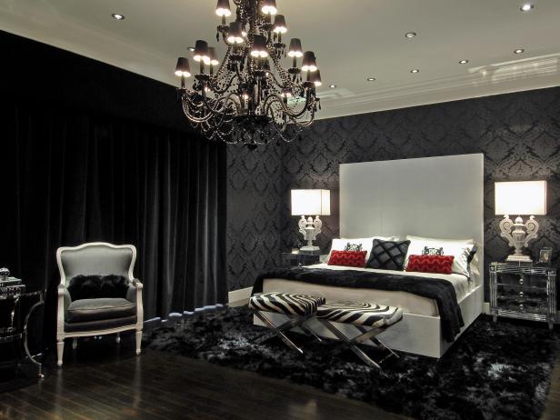 Master Bedroom With Black Chandelier, Gray Bed and Black Wallpaper