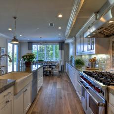 Dreamy Gourmet Kitchen with Wire-Brushed Wood Floors