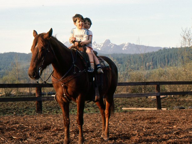 Young Property Brothers on a Horse