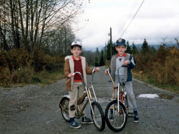 Property Brothers Jonathan and Drew Scott as kids on bikes.  