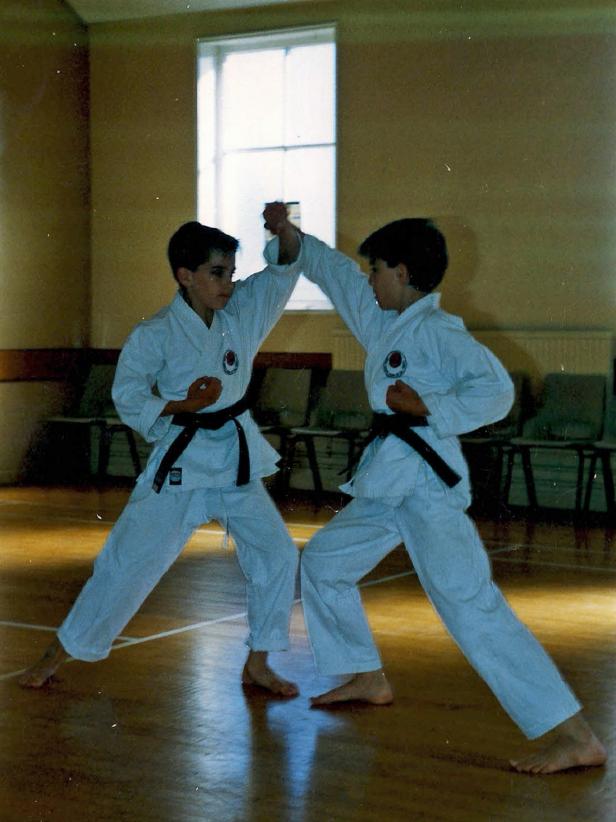 Young Drew and Jonathan Scott Practicing Karate
