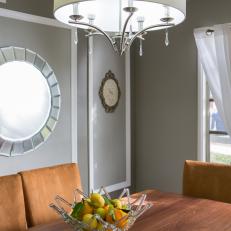 Gray Dining Room With Contemporary Chandelier