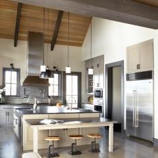Industrial Kitchen With Wooden Beams and Nature Scenes