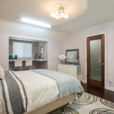 Casual Guest Bedroom with Hardwood Flooring
