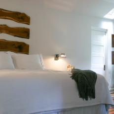 Transitional Bedroom Is All Natural With Skylight, Reclaimed Wood