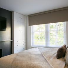 Transitional Bedroom with Steel Fireplace