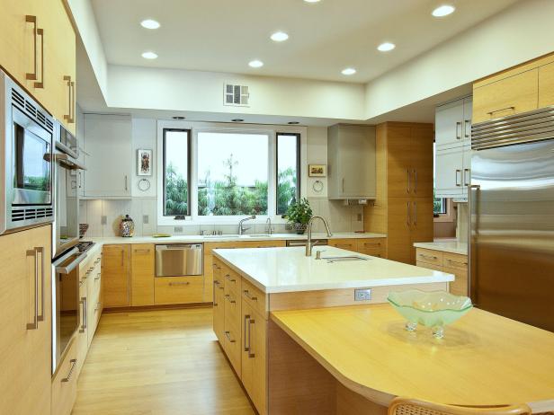Modern Kitchen with Oak Cabinets and Quartz Countertop | HGTV