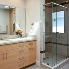 Modern Bathroom with Granite Tile and Frameless Mirror