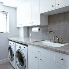 White Modern Laundry Room with Storage and Sink