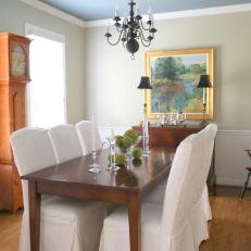 Green Traditional Dining Room With Wooden Table