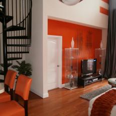 Eclectic Living Room With Bold Orange Accents
