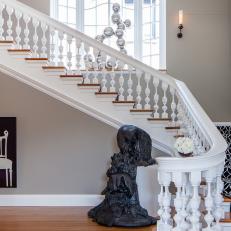 Transitional Staircase With Contemporary Artwork