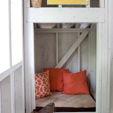 Cozy Pet Nook With Orange Pillows