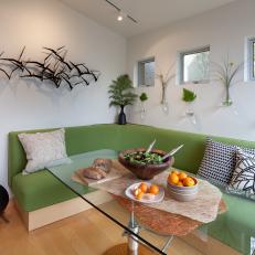 Modern Dining Area With Green Banquette and Under-Seat Storage 