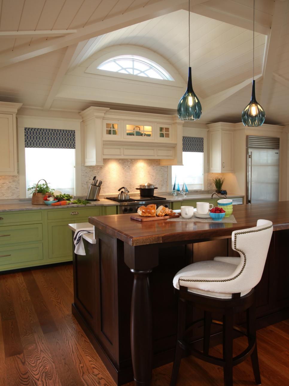 Spacious Kitchen With Wood Island and Green Cabinets | HGTV