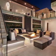 Spacious Atrium Courtyard with Built-In Seating and Fire Pit