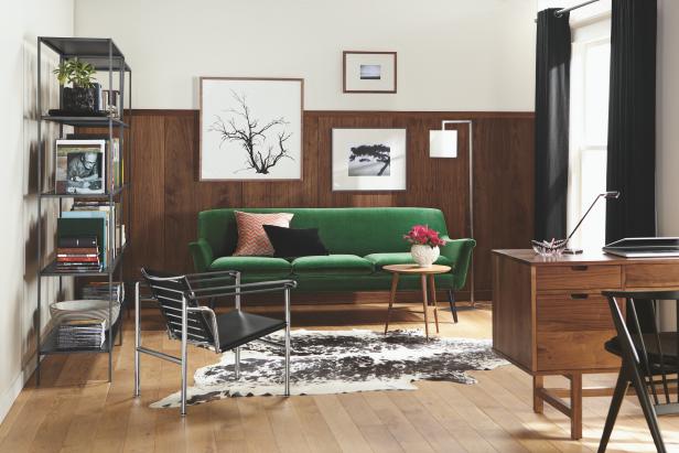 White Room With Wood Paneling, Desk, Open Bookshelf and Green Sofa