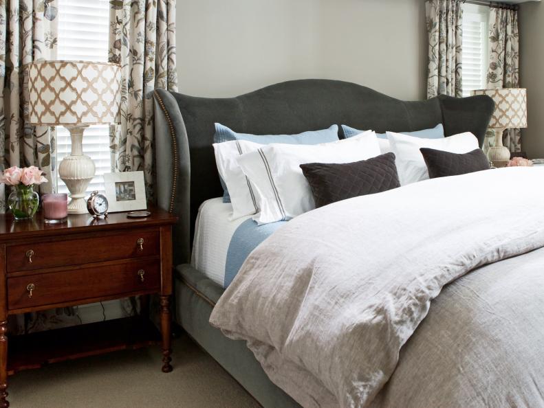Soft Gray Bedroom With Charcoal Gray Headboard and White Lamps
