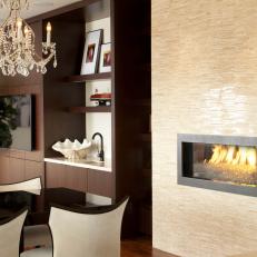 Modern Dining Room Gets Cozy Touch with Built-In Fireplace