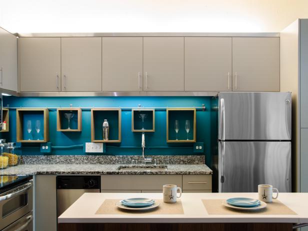 Midcentury Modern Kitchen With Gray Cabinets and a Blue Accent Wall