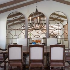 Neutral Transitional Dining Room With Beamed Vaulted Ceiling