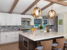 Neutral Transitional Kitchen With Eat-In Island and Barstools