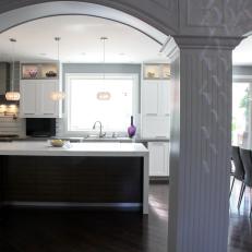 Transitional Kitchen with Columns and Arches