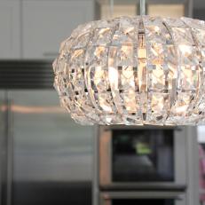 Crystal Pendant Lights Above Contemporary Kitchen Island
