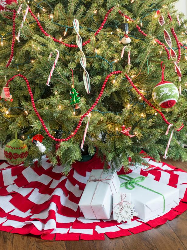 Add a sweet touch to your decorations by gluing or stitching up this playful felt Christmas tree skirt. Felt is perfect for this project because it's inexpensive and doesn't fray when cut. Learn how to easy it is to make one of your own with HGTV's step-by-step instructions.