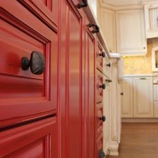 Red Kitchen Cabinets With Oil-Rubbed Bronze Knobs