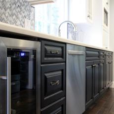 Transitional Kitchen With Black Cabinets and Wine Cooler