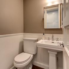 Small Traditional Powder Room With Wainscot