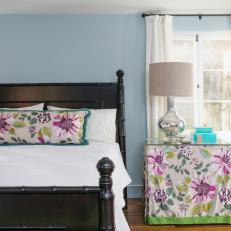 Blue Transitional Bedroom With Vibrant Floral Accent Fabric
