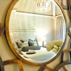 Transitional Bedroom Reflected in Mirror