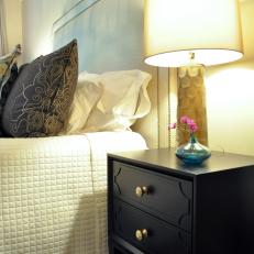 White Transitional Bedroom With Black Nightstand