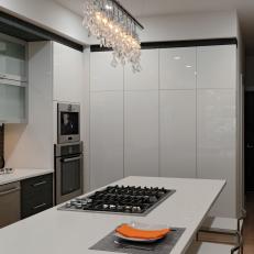 Modern White Kitchen With Crystal Chandelier