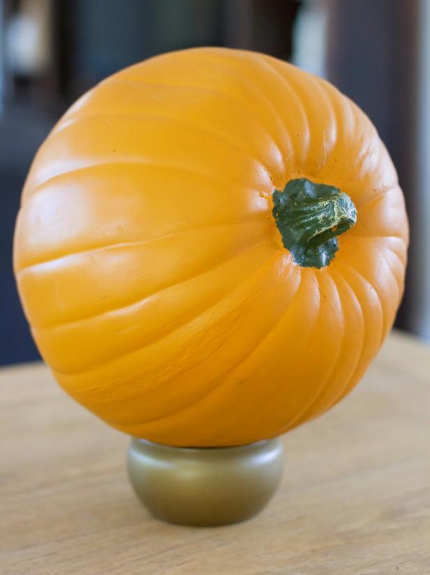 Place pumpkin on top of a small bowl so the stem is facing to the side.