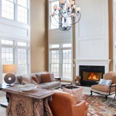 Brown and White Transitional Living Room With High Ceilings