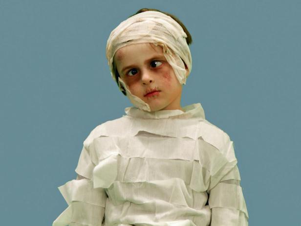 Boy in mummy costume